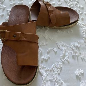 Never worn leather sandals size 9.